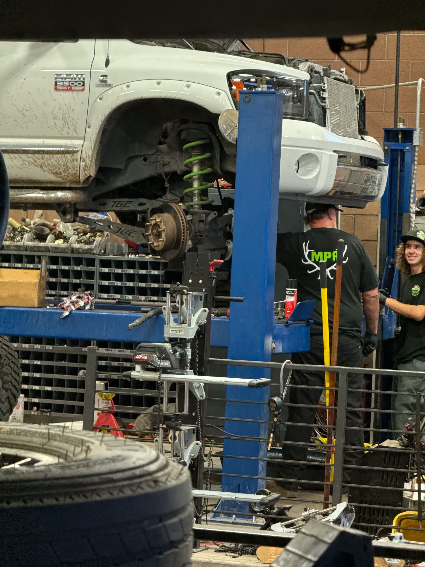 The MPA crew working on a Ram 3500 Heavy Duty in the alignment bay