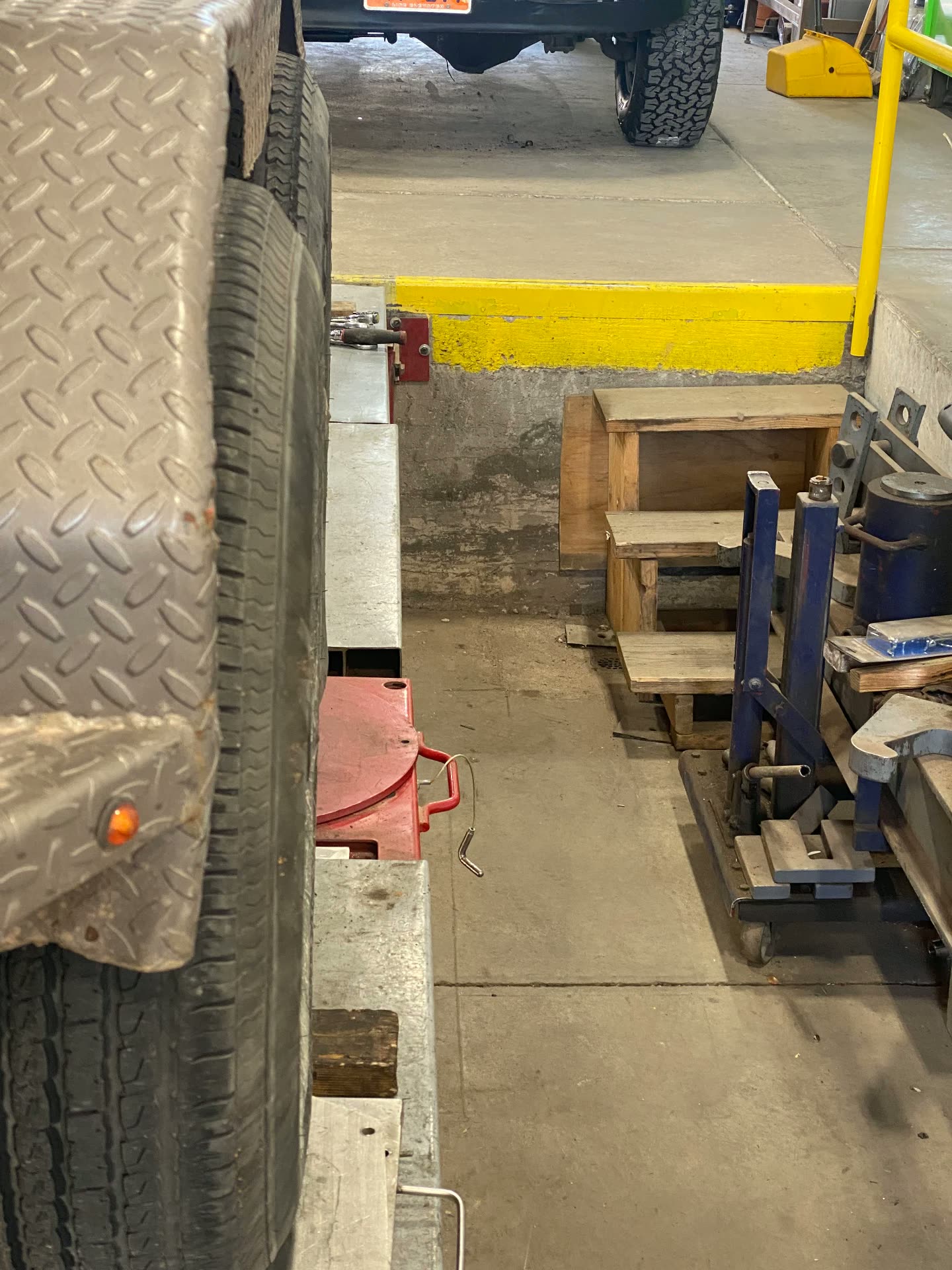 Trailer axle set up on the alignment turnplates at MPA