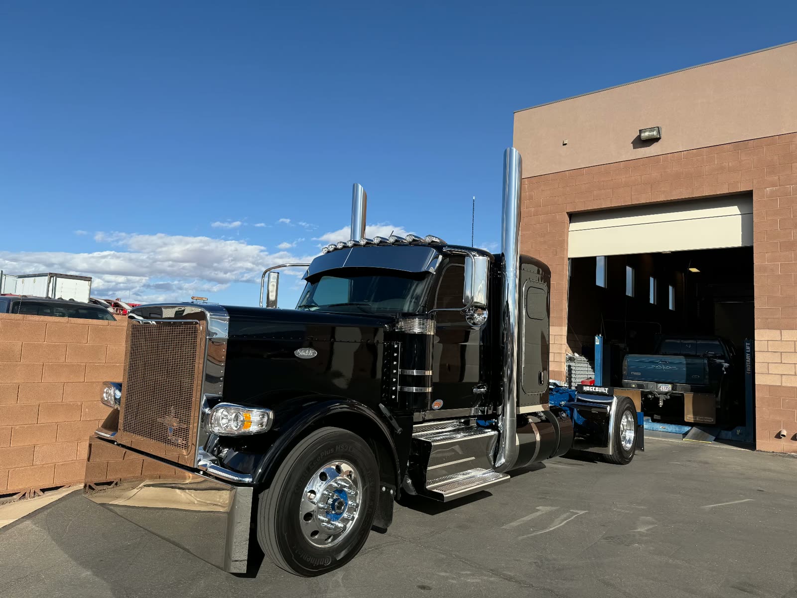 Black Peterbilt semi tractor outside the MPA heavy duty bay